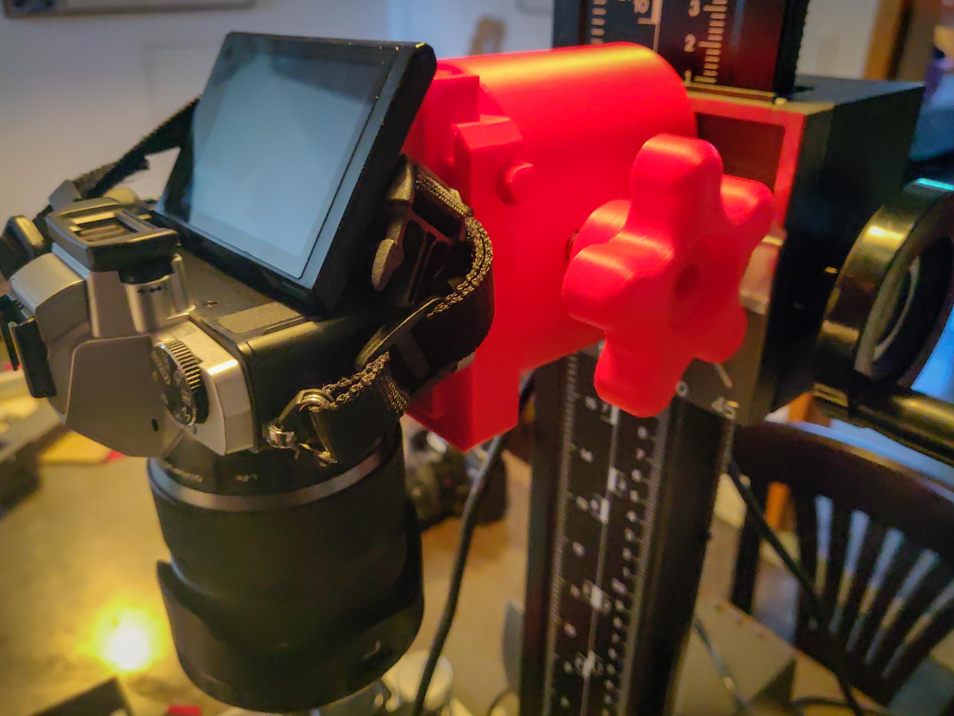 The repro adapter mounted on the column of the M605 with the camera attached. The repro adapter mounted on the column of the M605 with the camera attached.