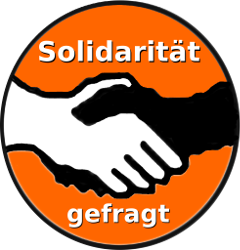 Der Solibutton zeigt zwei verschränkte Hände und die Unterschrift: "Solidarität gefragt".